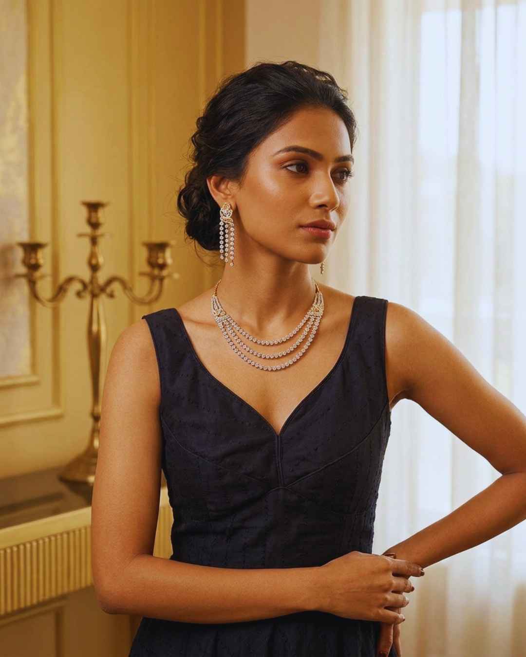 Woman wearing Celeste dainty layered necklace set silver tone AD crystal with drop earrings by Ethnyk Dori